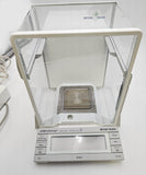 Mettler Toledo analytical balance on a white background
