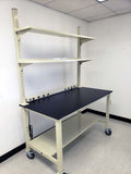 mobile lab bench with adjustable upper shelves, casters, phenolic resin countertop, power strip, and lower shelf